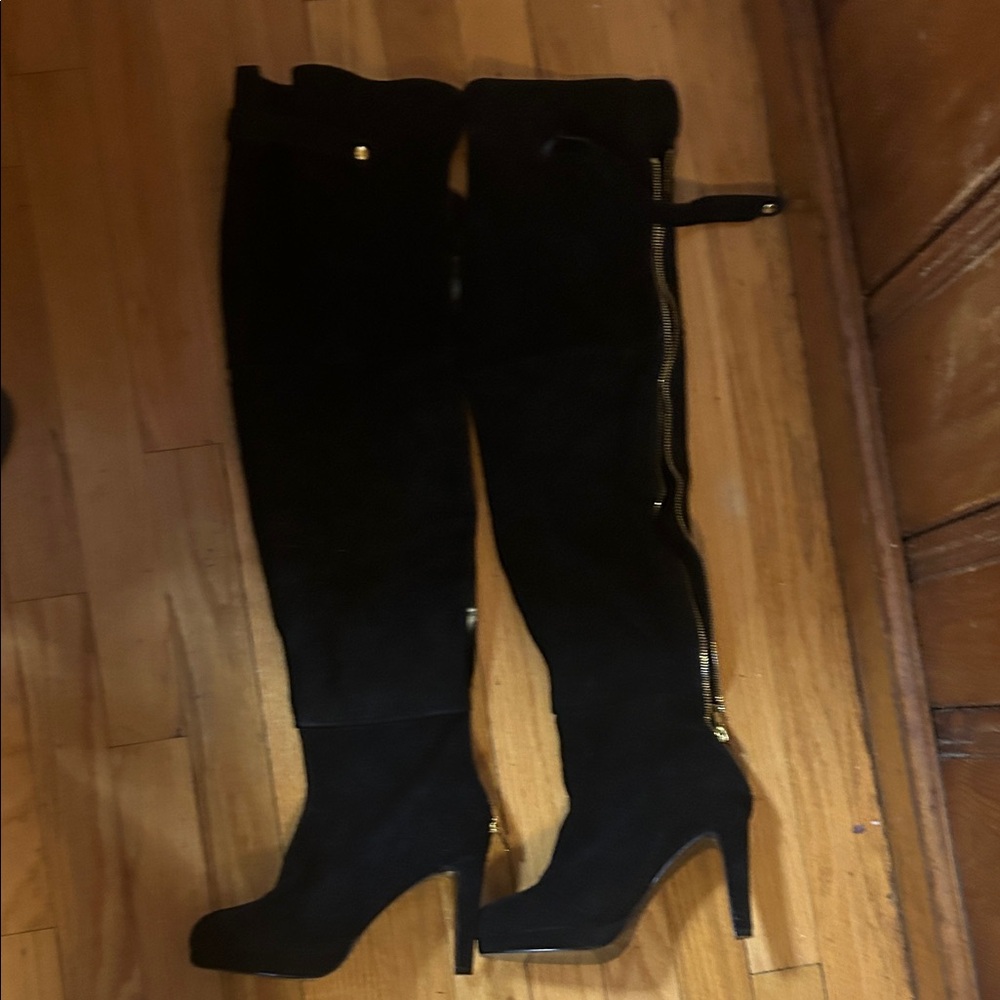 Chic Black Over-the-Knee Boots with Gold Accents